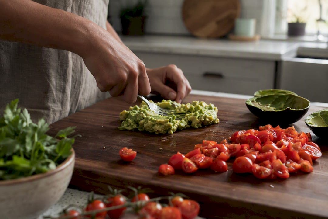 Hands preparing eggs and bell peppers for protein and vitamin C